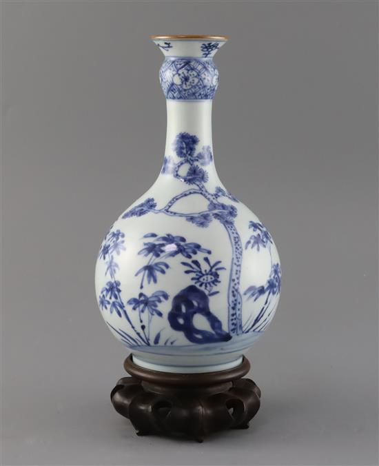 A Chinese blue and white guglet vase, 18th century, H. 23.5cm, wood stand